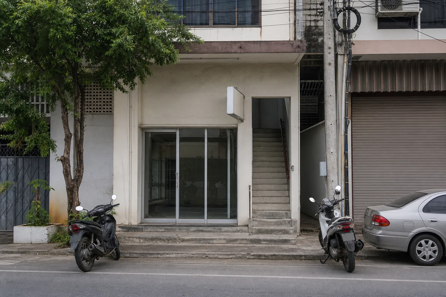The street entrance and stairway up to the studio